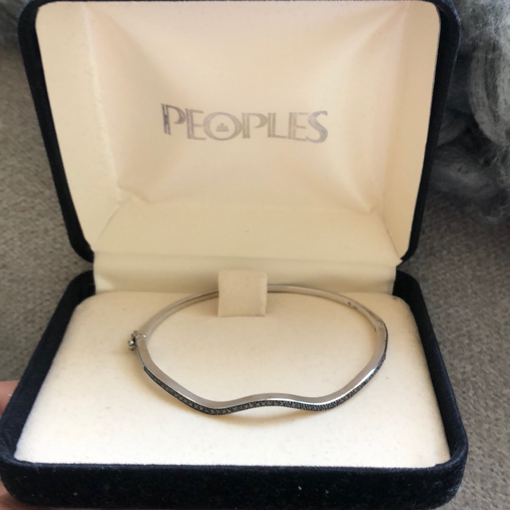 Silver bracelet.